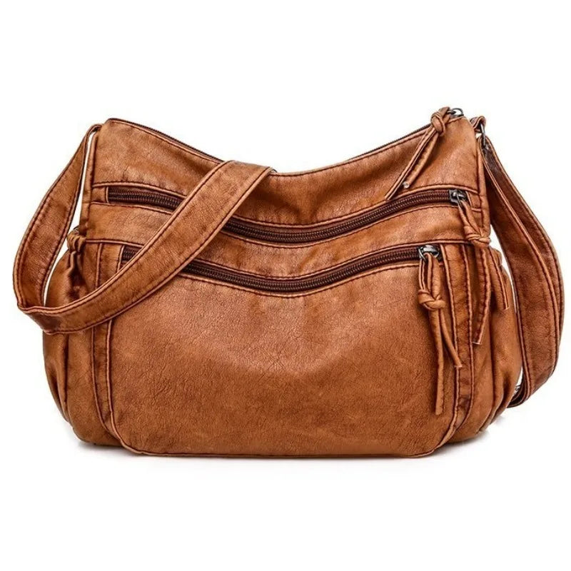 Sac à main ALIZÉE multipoche en bandoulière marron, en cuir souple, design moderne et pratique, idéal pour transporter vos essentiels au quotidien