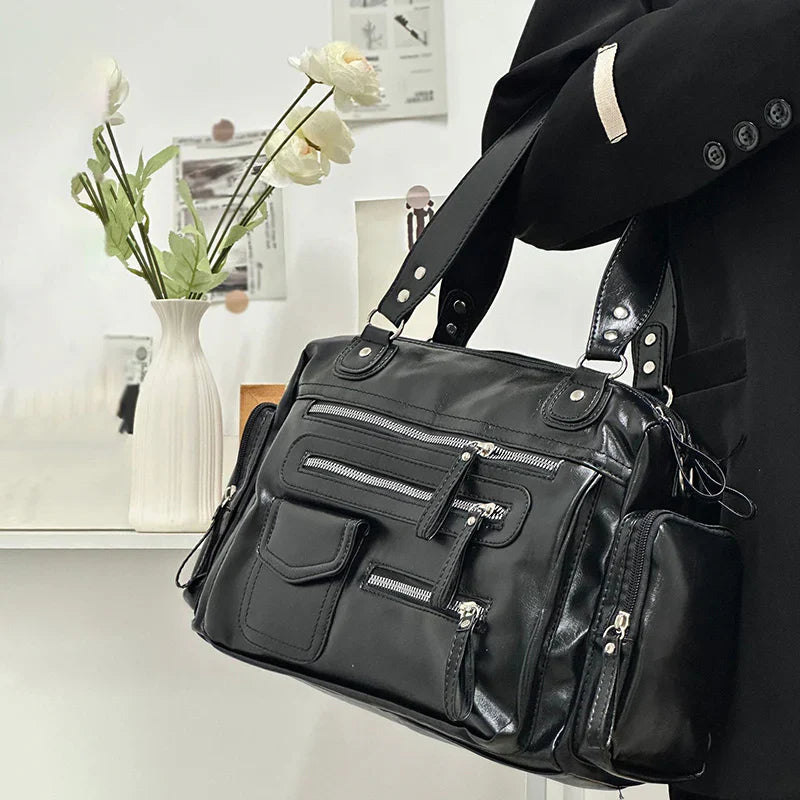 sac à main cuir rétro noir BIANCA avec multiples poches à fermetures éclair, élégant et pratique pour femme active
