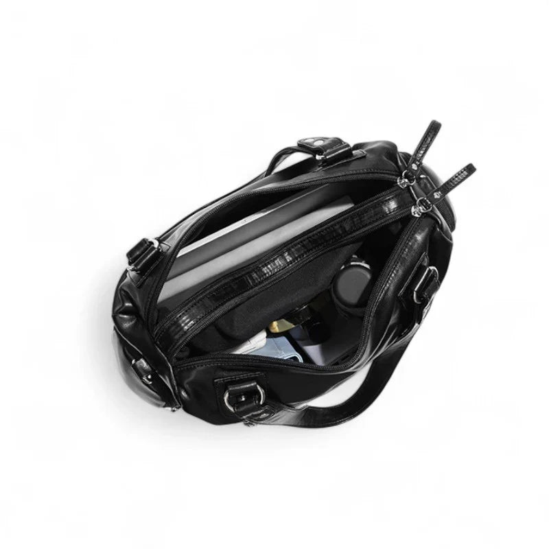 sac à main cuir rétro noir BIANCA avec multiples poches à fermetures éclair, élégant et pratique pour femme active, vue interieur sac.
