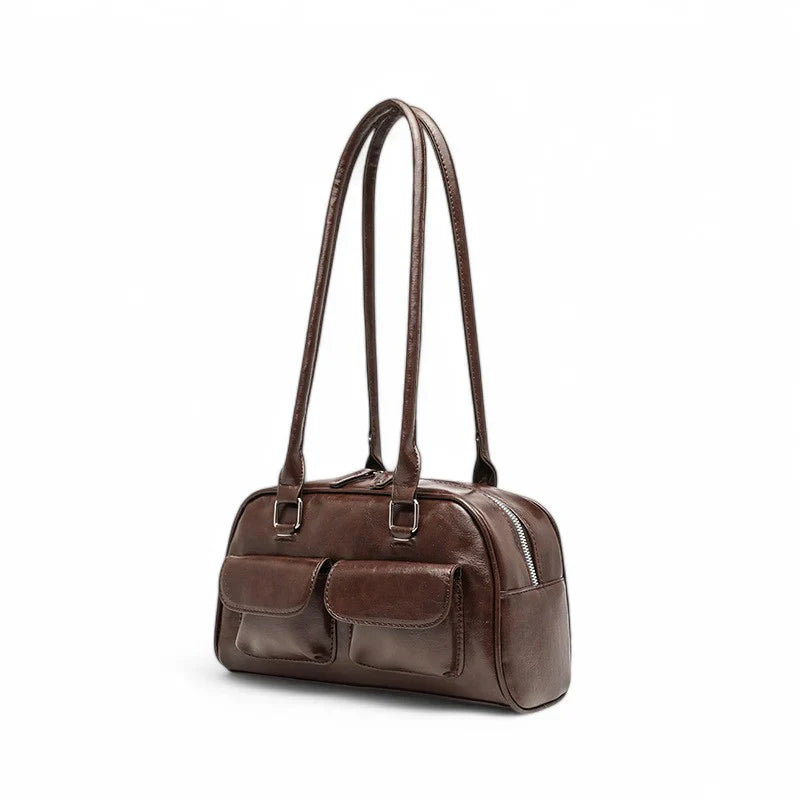 Sac à main élégant en cuir multipoches vue sur le côté