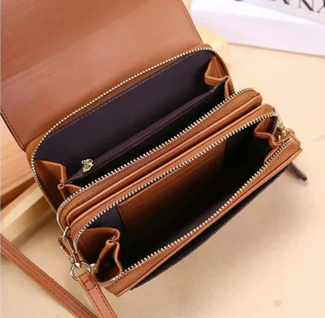 Sac à main CASSIE en cuir synthètique bandoulière ajustable, avec rabat, compartiments et poches pour organiser vos essentiels avec style et praticité, VUE INTERIEURE.