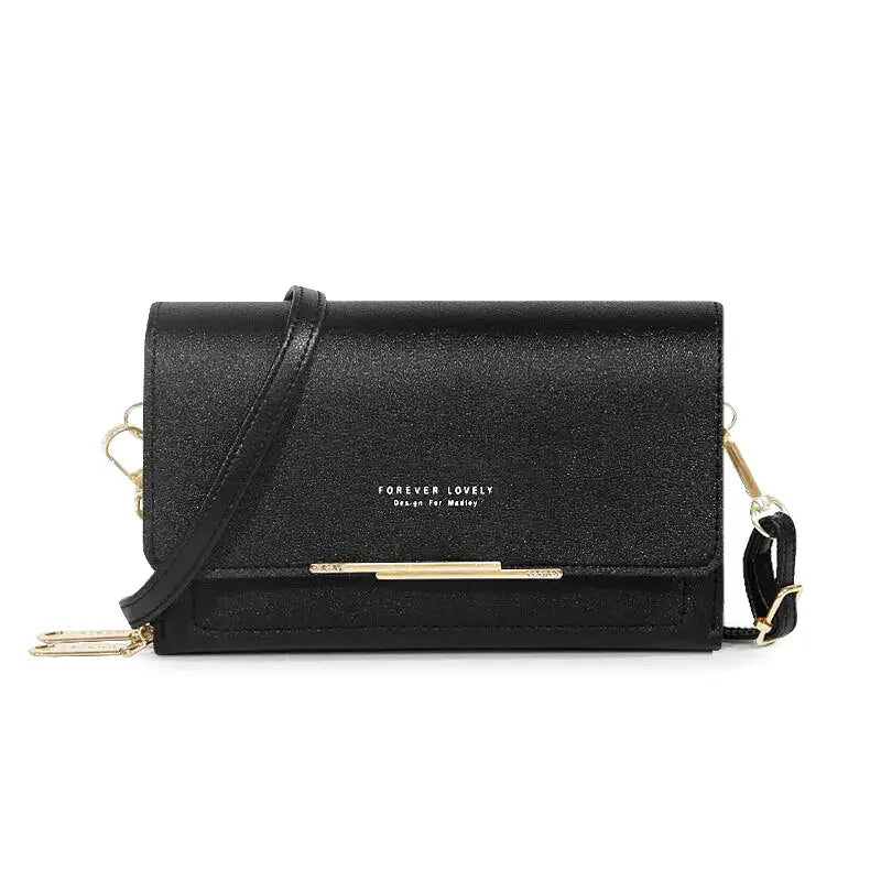 Sac à main CASSIE en cuir synthètique noir, bandoulière ajustable, avec rabat, compartiments et poches pour organiser vos essentiels avec style et praticité.