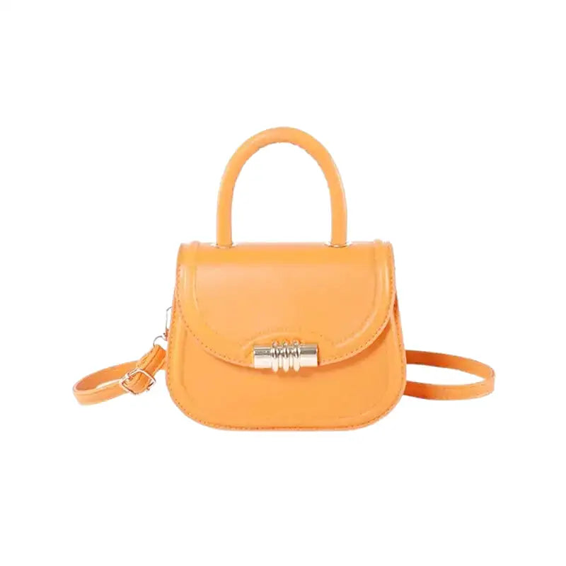 Petit sac à main rigide ELISA en bandoulière orange, design compact et élégant, idéal pour transporter téléphone, porte-cartes et clés avec style