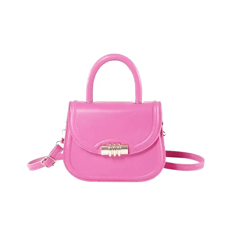 Petit sac à main rigide ELISA en bandoulière rose, design compact et élégant, idéal pour transporter téléphone, porte-cartes et clés avec style
