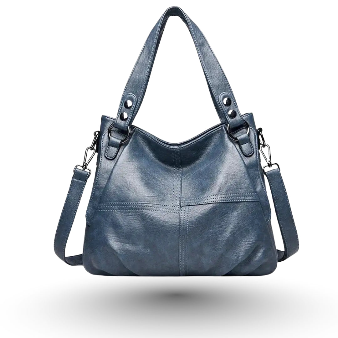 ELOWEN – Sac à main de cours en cuir bleu avec bandoulière, pratique et élégant.