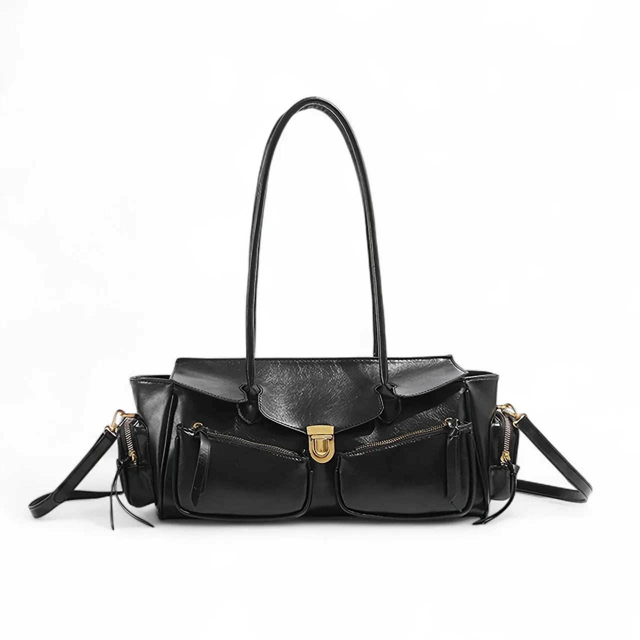 Sac à main Jila en cuir, spacieux et structuré, idéal pour transporter téléphone, portefeuille et accessoires avec style et praticité.