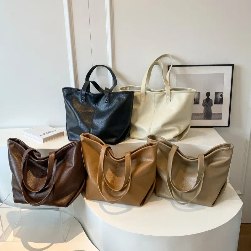 Sac à main KIM en cuir moderne et pratique, grand sac tote bag avec intérieur spacieux et finitions soignées, parfait pour le quotidien et le travail.