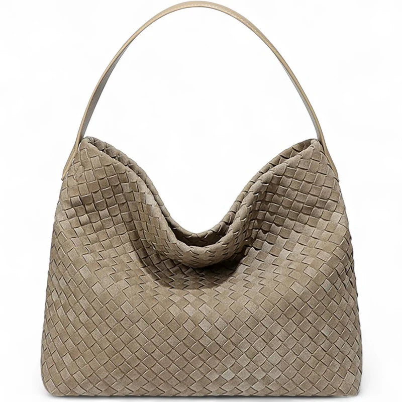 Découvrez MIKA, sac cabas tissé beige grand format pour femmes actives : chic, pratique, compatible ordinateur 15". Parfait au quotidien !