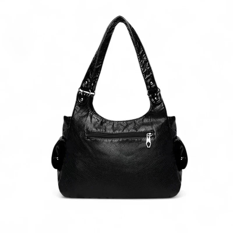 Grand sac à main femme VICTOIRE en cuir  noir élégant et structuré, spacieux et organisé, parfait pour transporter ordinateur, cahiers et essentiels avec style et praticité.